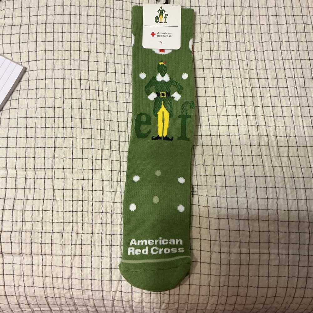 Elf socks. American Red Cross Ages 14+. One size Christmas green